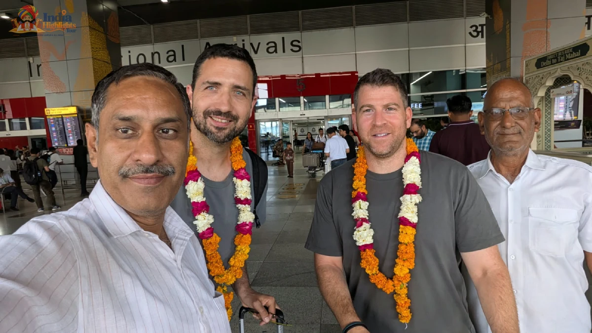 International Arrival & Floral Welcome at Delhi Airport International guests greeted with fresh floral garlands at Indira Gandhi International Airport arrival terminal in Delhi